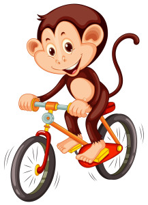 Раскрашенная картинка: счастливая обезьяна катается на велосипеде